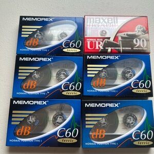 Bundle of recordable audio cassette tapes.